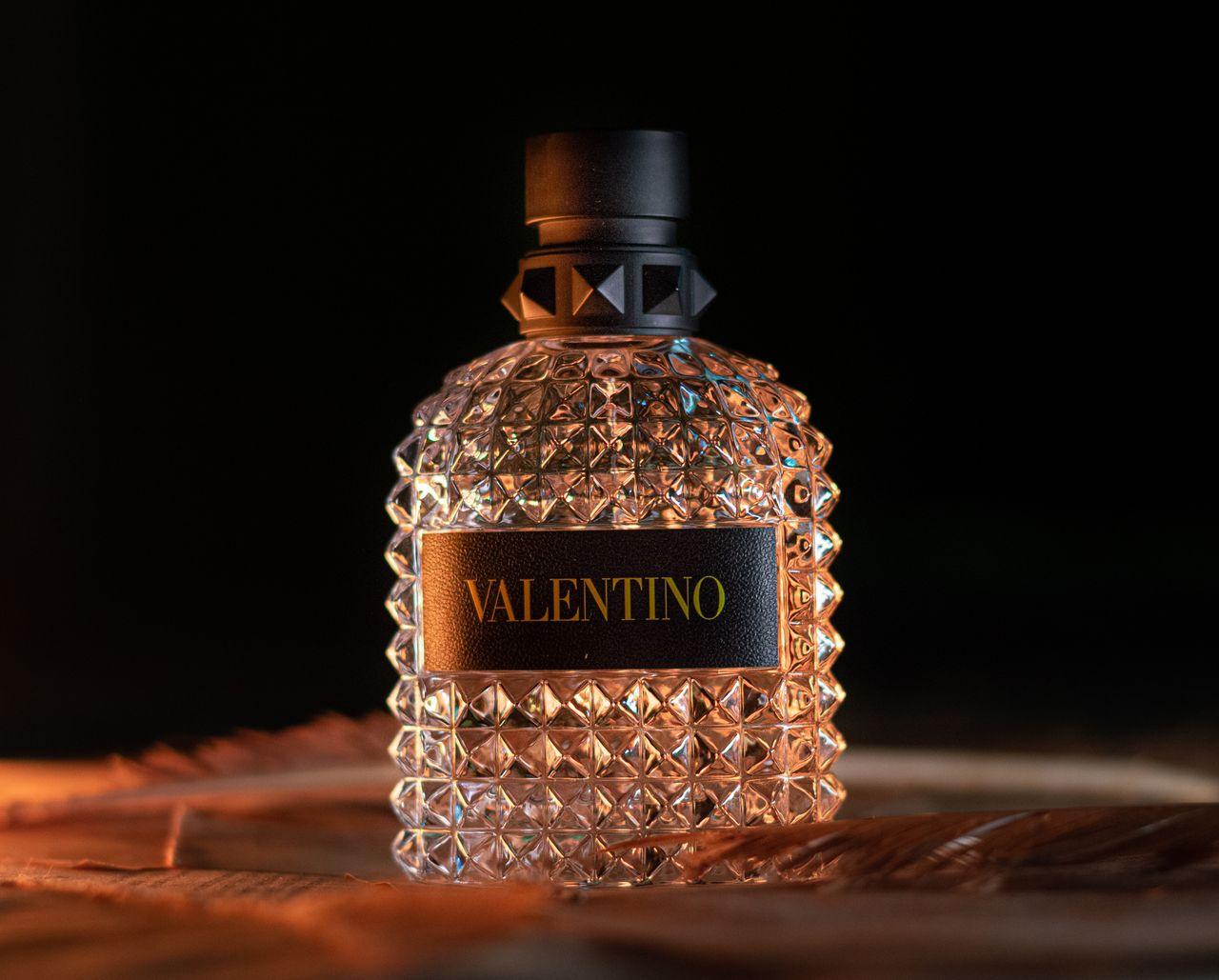 cta-02 Elegant close-up of Valentino perfume bottle showcasing luxury and premium design.